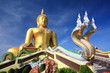 Big golden buddha with blue sky, Ang Thong province, Thailand.