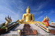 Big golden buddha with blue sky, Ang Thong province, Thailand.
