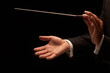 Foto: Conductor conducting an orchestra Conductor conducting an orchestra