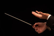 Foto: Concert conductor hands with baton Concert conductor hands with baton