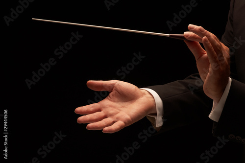 Photo: Conductor conducting an orchestra Conductor conducting an orchestra