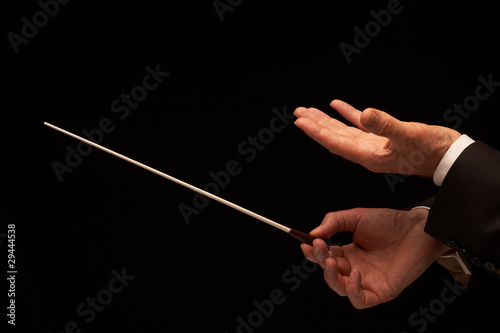 Photo: Concert conductor hands with baton Concert conductor hands with baton