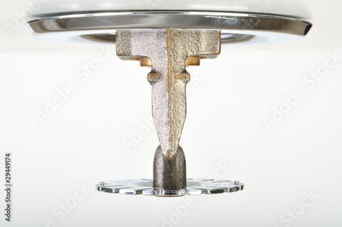 Photo: Close up image of fire sprinkler on white. Close up image of fire sprinkler on white.