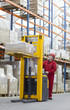 Photo: Senior manual forklift operator in warehouse Senior manual forklift operator in warehouse