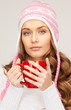 beautiful woman with red mug