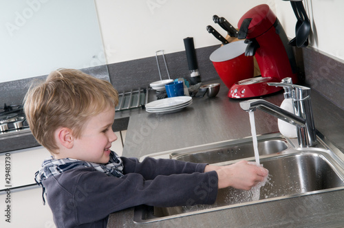 Photo: Child washing his hands Child washing his hands