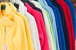 multicolor sport shirts hanging in store multicolor sport shirts hanging in store