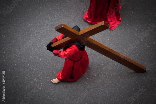 Photo: Nazareno carrying the Holy Cross in Holy Week. Valladolid Nazareno carrying the Holy Cross in Holy Week. Valladolid
