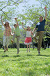 Happy family jumping