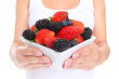 canvas print picture Woman Holding Berries