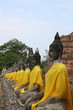 Buddha Statue in a row with sky Buddha Statue in a row with sky