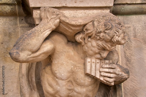 Photo: Satyr with panflute on Wallpavillion of Zwinger Palace, Dresden Satyr with panflute on Wallpavillion of Zwinger Palace, Dresden