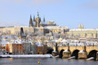 Romantic Snowy Prague gothic Castle with the Charles Bridge Romantic Snowy Prague gothic Castle with the Charles Bridge