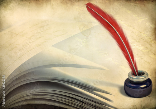 Photo: Opened book pages and inkstand Opened book pages and inkstand