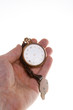 Hand Old Brass Pocket Watch Isolated Background