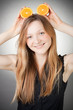 Beautiful young woman has orange ears Beautiful young woman has orange ears