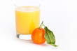 Glass of orange juice and an orange