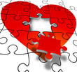puzzle a forma di cuore con tessera