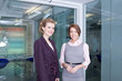 Two confident businesswomen in office