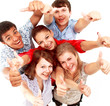 Top view of young friends with hands raised