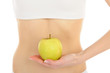 Foto: woman with beautiful body holding an apple near the slim waist. woman with beautiful body holding an apple near the slim waist.