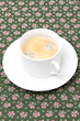 the cup of coffee on the table