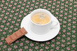 the cup of coffee on the table