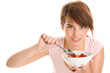 Young woman eating muesli Young woman eating muesli