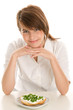 Woman eating bread with cottage cheese and chives Woman eating bread with cottage cheese and chives