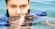Female face in sea