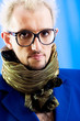 Photo: Man with blue jacket in studio shooting Man with blue jacket in studio shooting