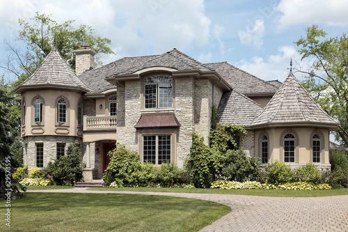 Photo: Luxury stone home with turret Luxury stone home with turret