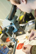 jeweller is working with microscope jeweller is working with microscope