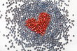 Background from beads with red hearts