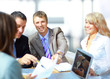 Business meeting - manager discussing work with his Business meeting - manager discussing work with his