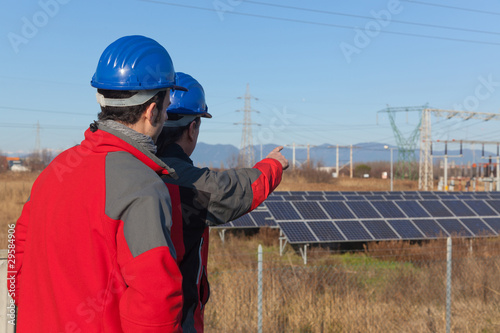Photo: Engineers at Work In a Solar Power Station Engineers at Work In a Solar Power Station
