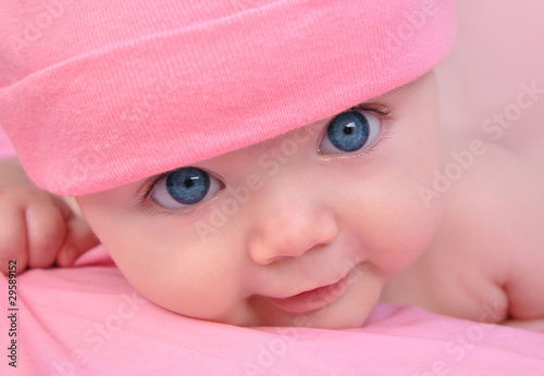 Photo: Pink Little baby Girl with Big Eyes Pink Little baby Girl with Big Eyes