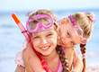 Children Playing On  Beach.
