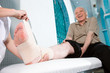 Senior man with hurted leg