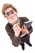 nerd guy smiling into  a magnifying glass