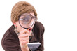 ner guy looking through a mganifyer