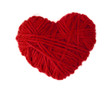 a heart made of red wool yarn