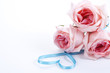 Bouquet of roses with ribbon in heart shape