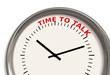 A clock with words Time to talk on its face