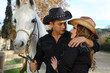 Couple with white horse