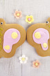 batterfly ginger cookies with sugar flowers on old white table batterfly ginger cookies with sugar flowers on old white table