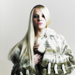Beautiful woman in fur coat