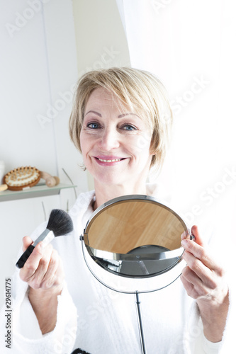 Photo: Woman Making Up Woman Making Up
