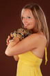 woman holding a snake woman holding a snake