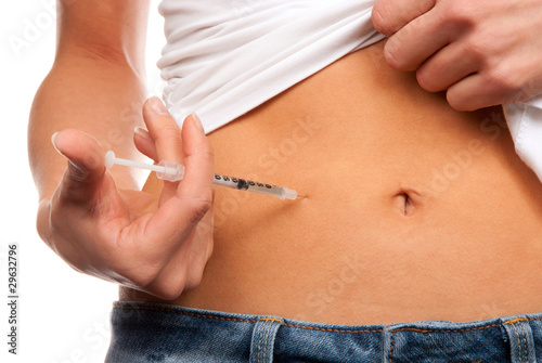 Foto: Insulin dependent Diabetes patient abdomen injection Insulin dependent Diabetes patient abdomen injection
